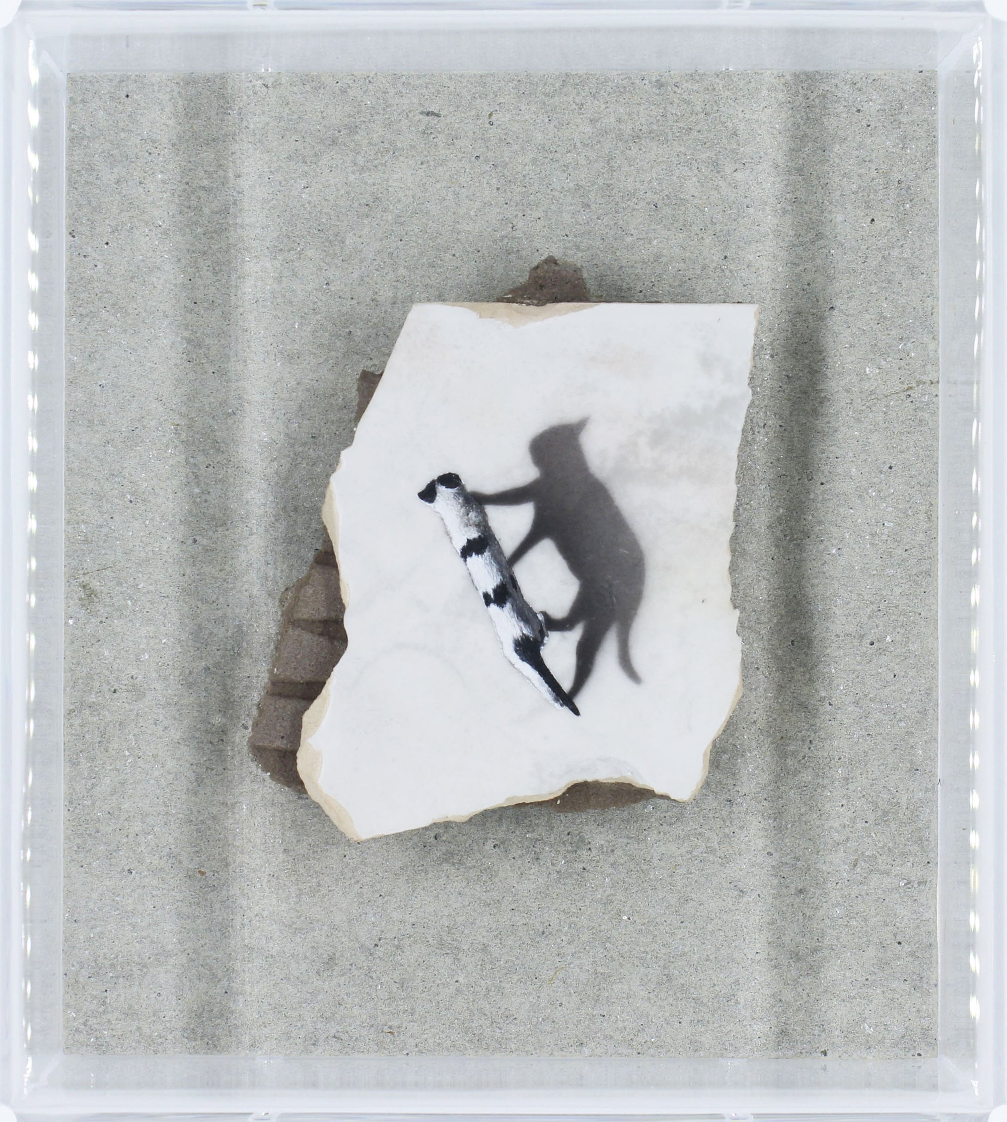 a cat painting with its shadow on piece of tile