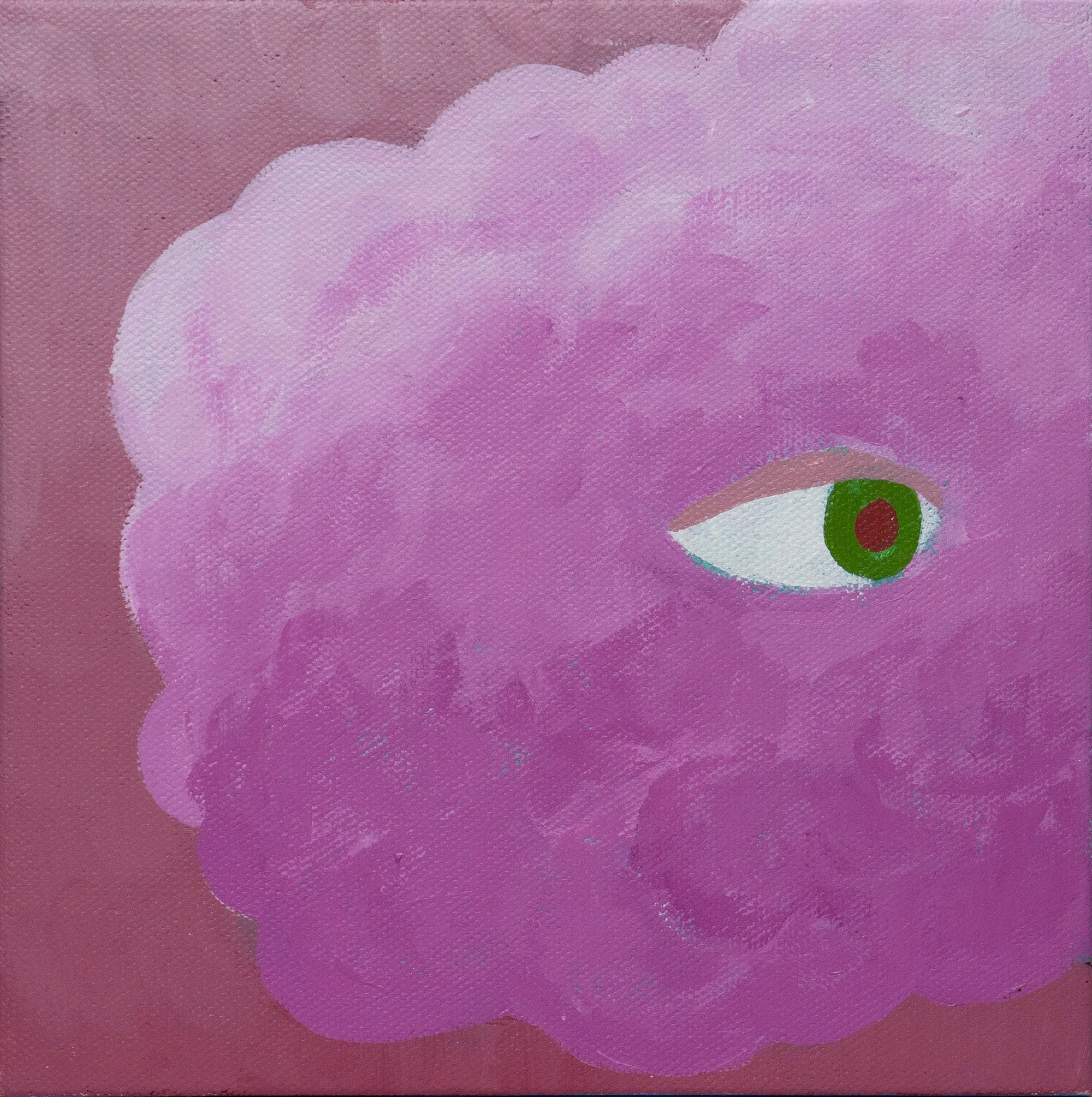a pink cloud with an eye